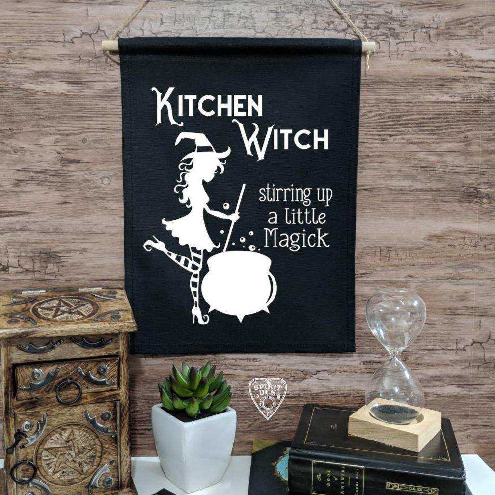 Kitchen Witch Stirring up a Little Magick Black Canvas Wall Banner - The Spirit Den